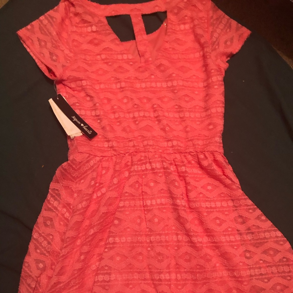 Short sleeve knee length dress Coral in color